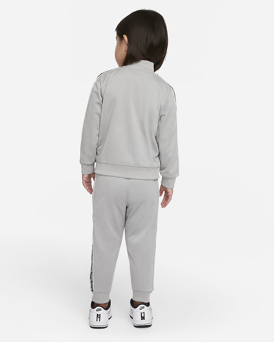 Baby grey nike tracksuit new arrivals